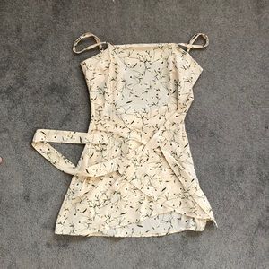 Cream wrapped dress with trendy floral pattern